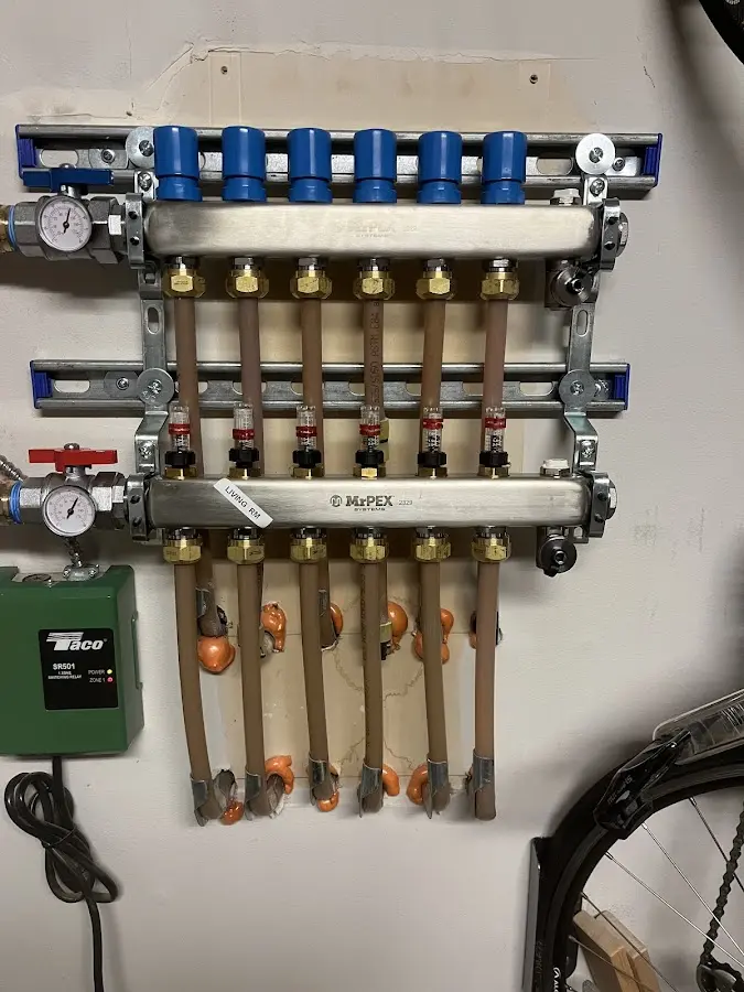 Plumber performing Gas Line Installation at a residential property in Buxton