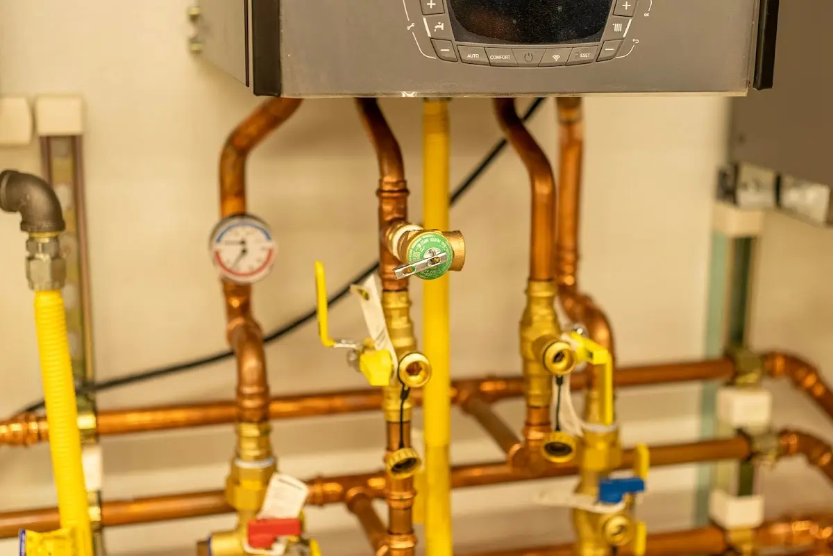 Licensed technician providing Water Heater Installation for a homeowner in Buxton